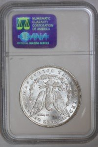 Сребърен долар За Морган 1885 MS65 NGC Монети, Монетен двор на Съединените Щати
